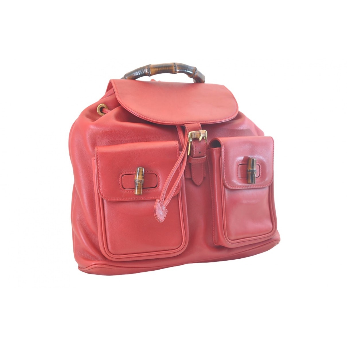 Gucci red leather backpacks