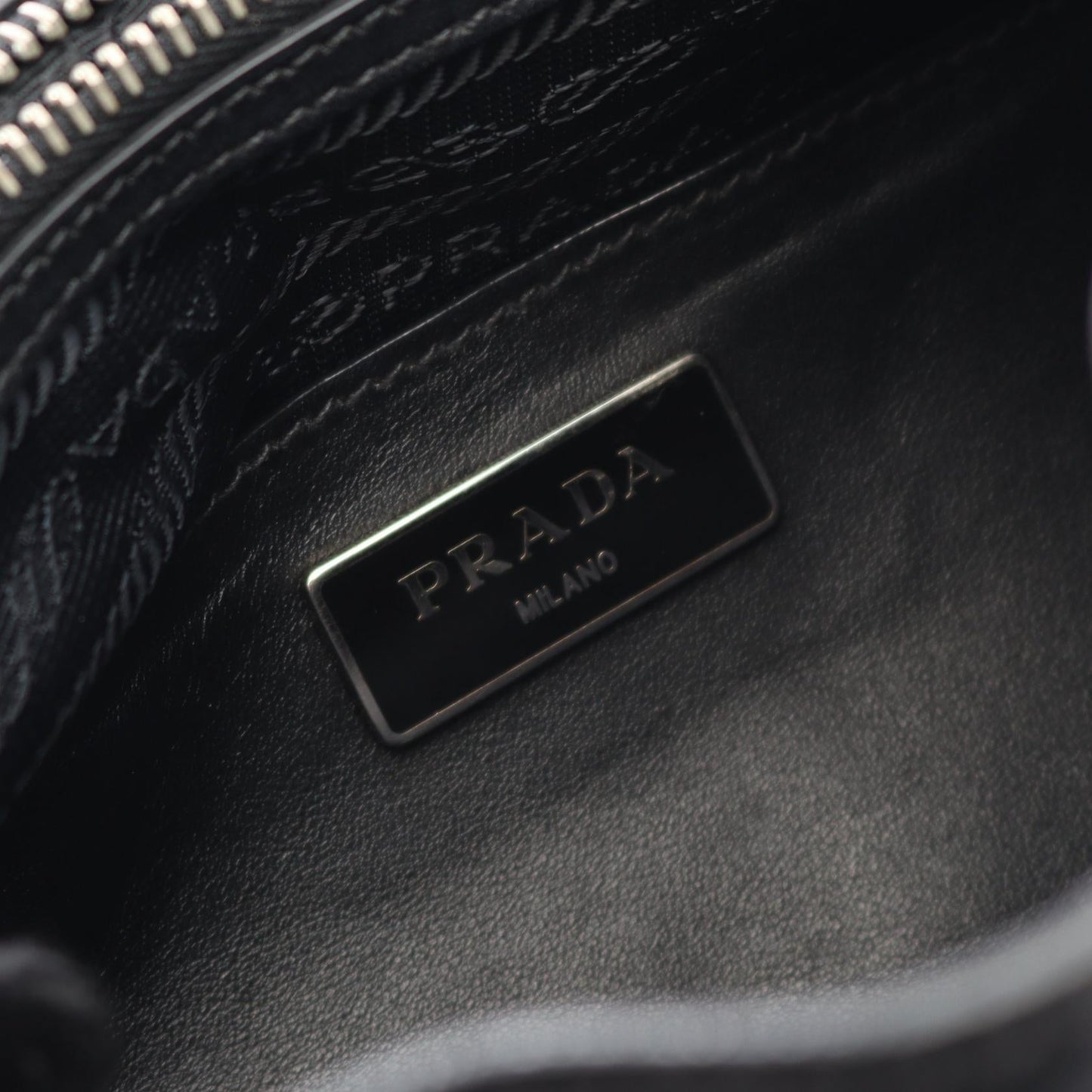 Prada Triangle Logo Leather Backpack