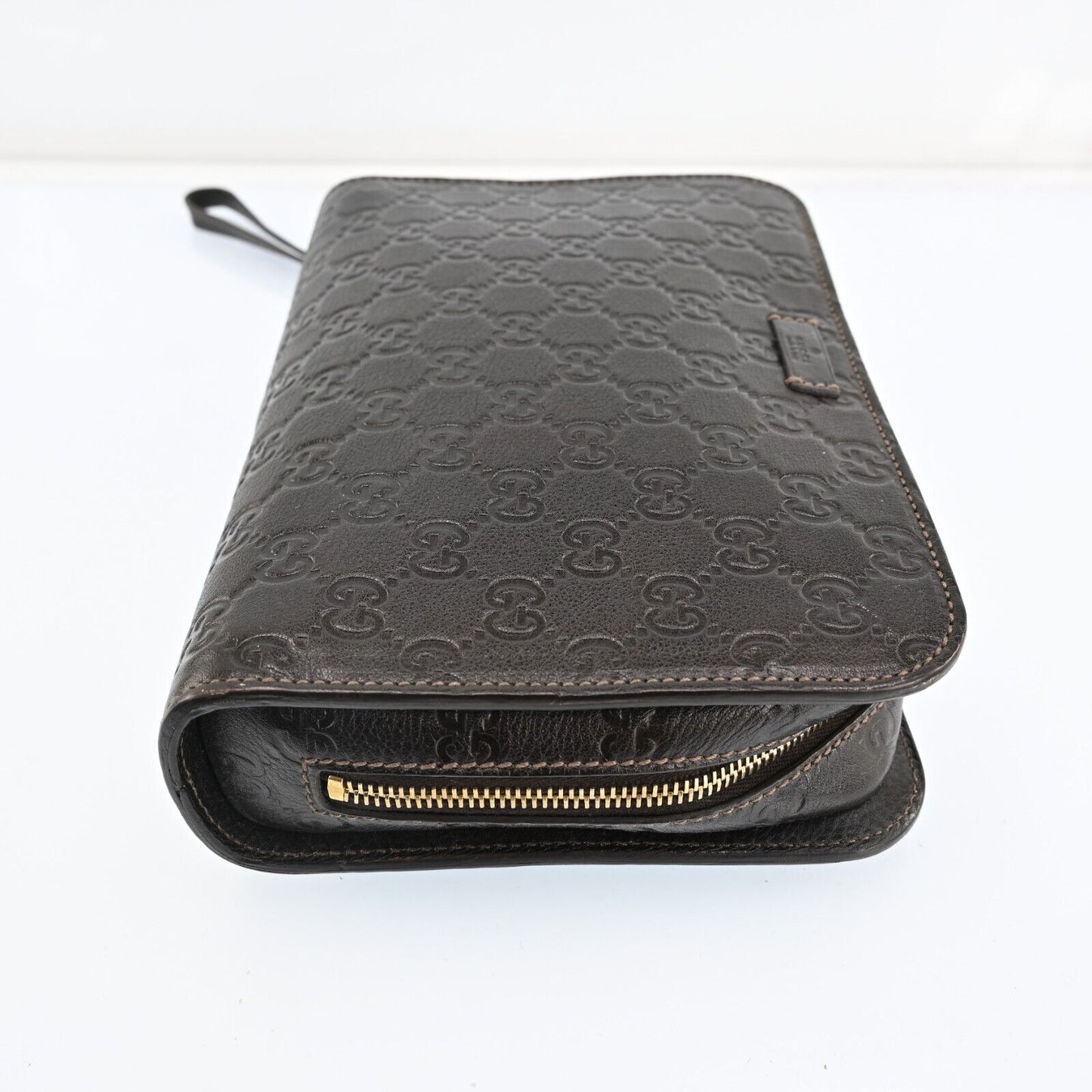 Gucci Monogram Leather Clutch