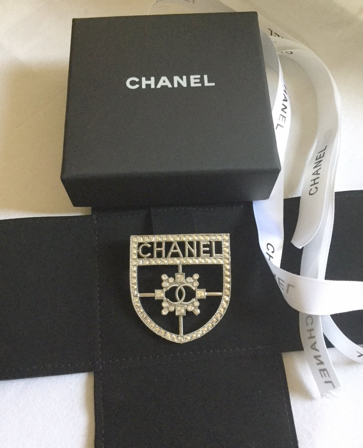 CHANEL CC Crystal Crest Shield Armor Brooch Handbag