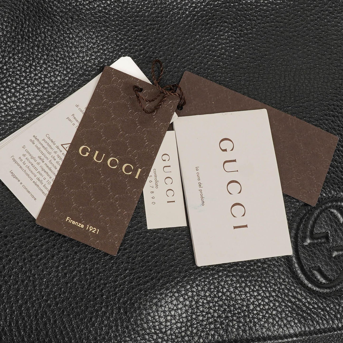 Gucci Pebbled Black Leather Messenger Bag