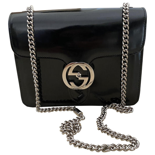Gucci interlocking black patent leather handbag