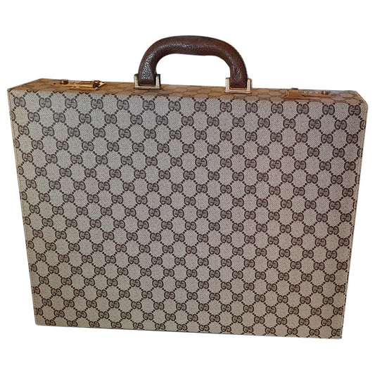 Gucci brown cloth travel bag