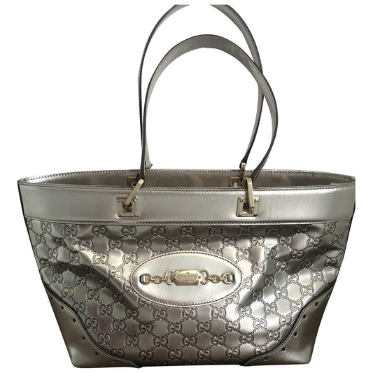 Gucci gold leather handbag