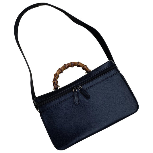 Gucci bamboo black leather travel bag