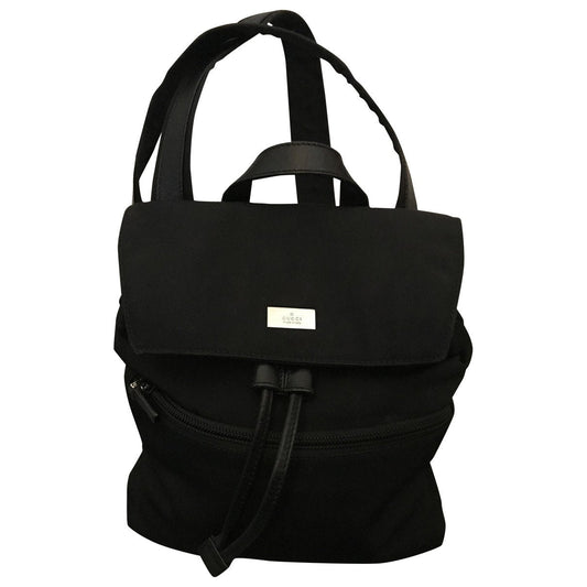 Gucci black cloth backpacks