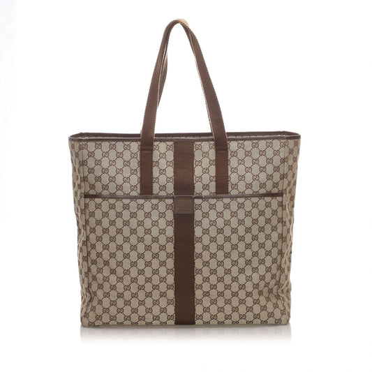 Gucci brown cloth travel bag