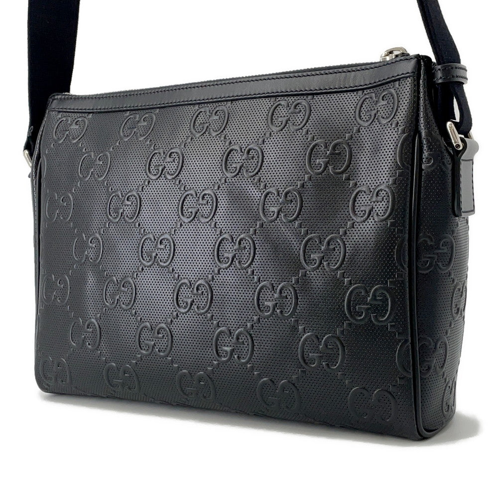 GUCCI GG-embossed messenger bag Black658565 Leather