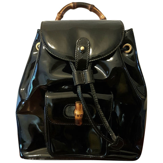 Gucci bamboo black patent leather backpacks