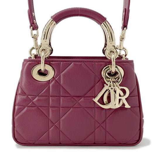 Christian Dior Bordeaux Champagne Gold Leather Handbag  