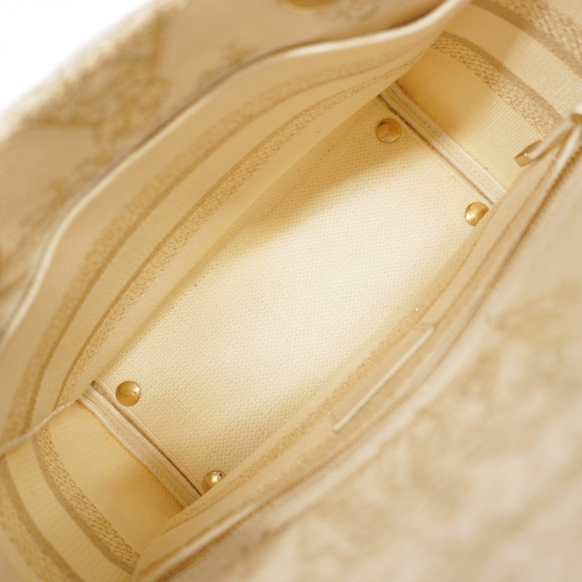 Christian Dior Gold White Canvas Handbag  