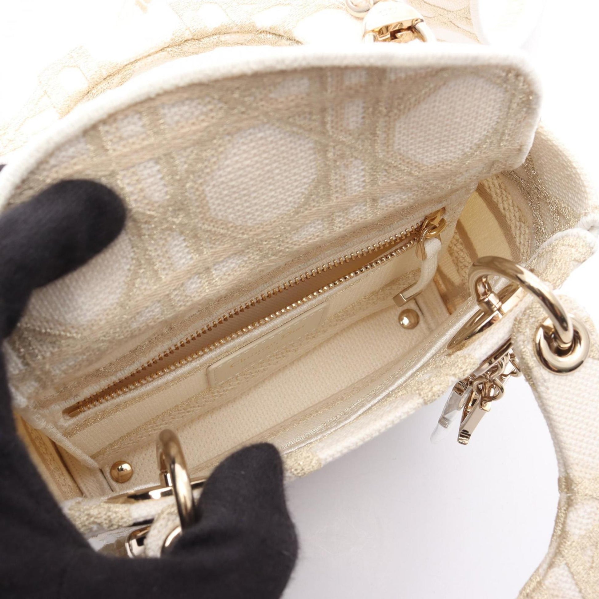 Christian Dior Gold White Canvas Handbag  