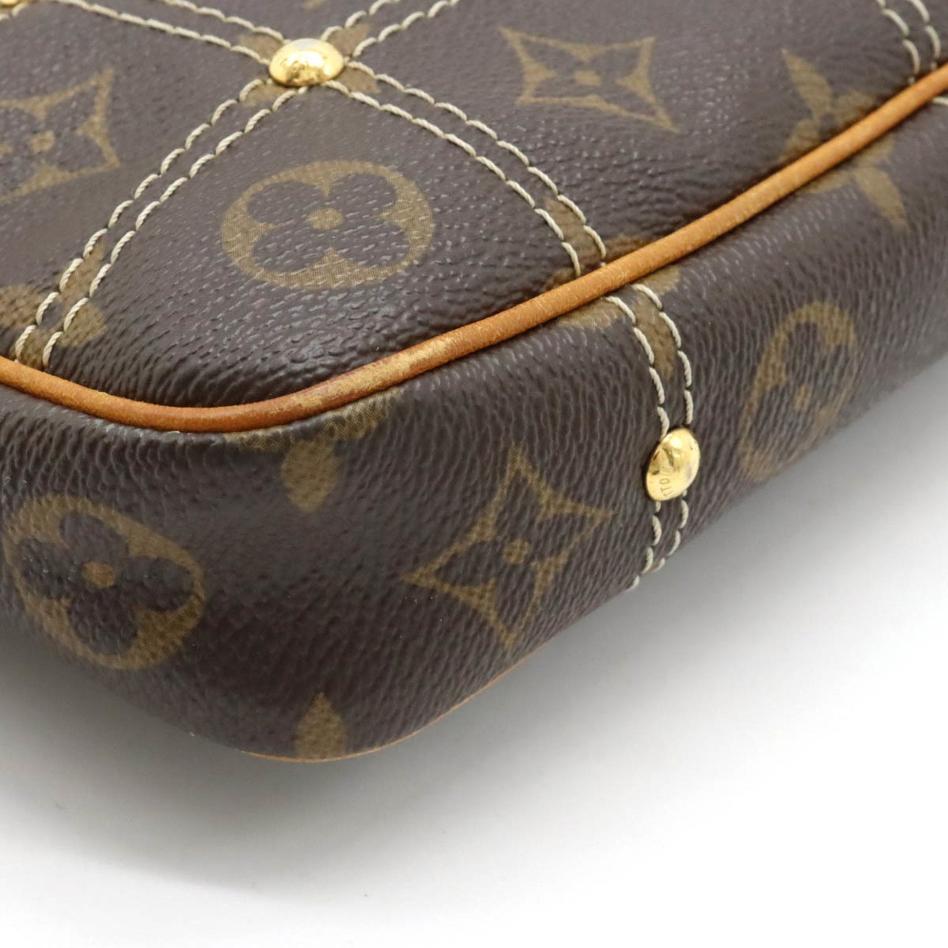 LOUIS VUITTON Monogram Rivet Pochette Accessoire Stitch Clutch