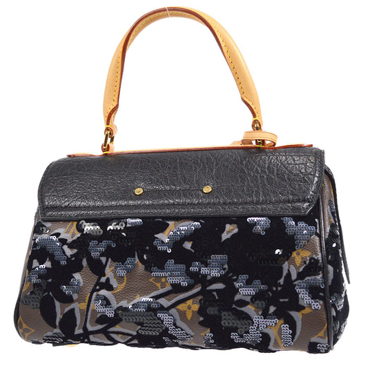 LOUIS VUITTON 2010 CARROL MONOGRAM FLEUR DUGE M40434