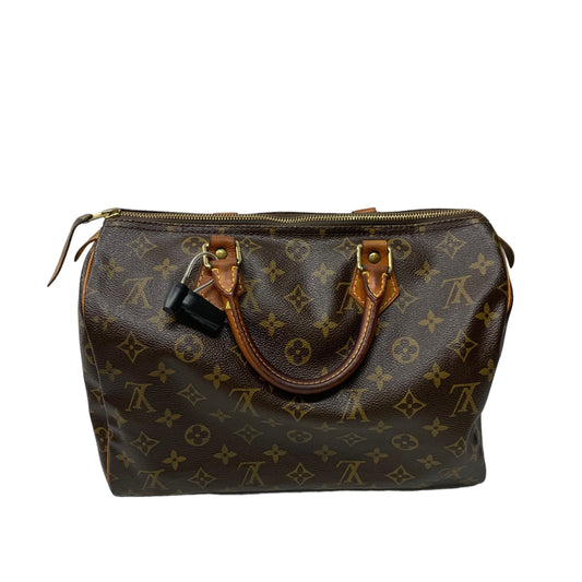 HandBag Luxury Designer By Louis Vuitton Size: Medium