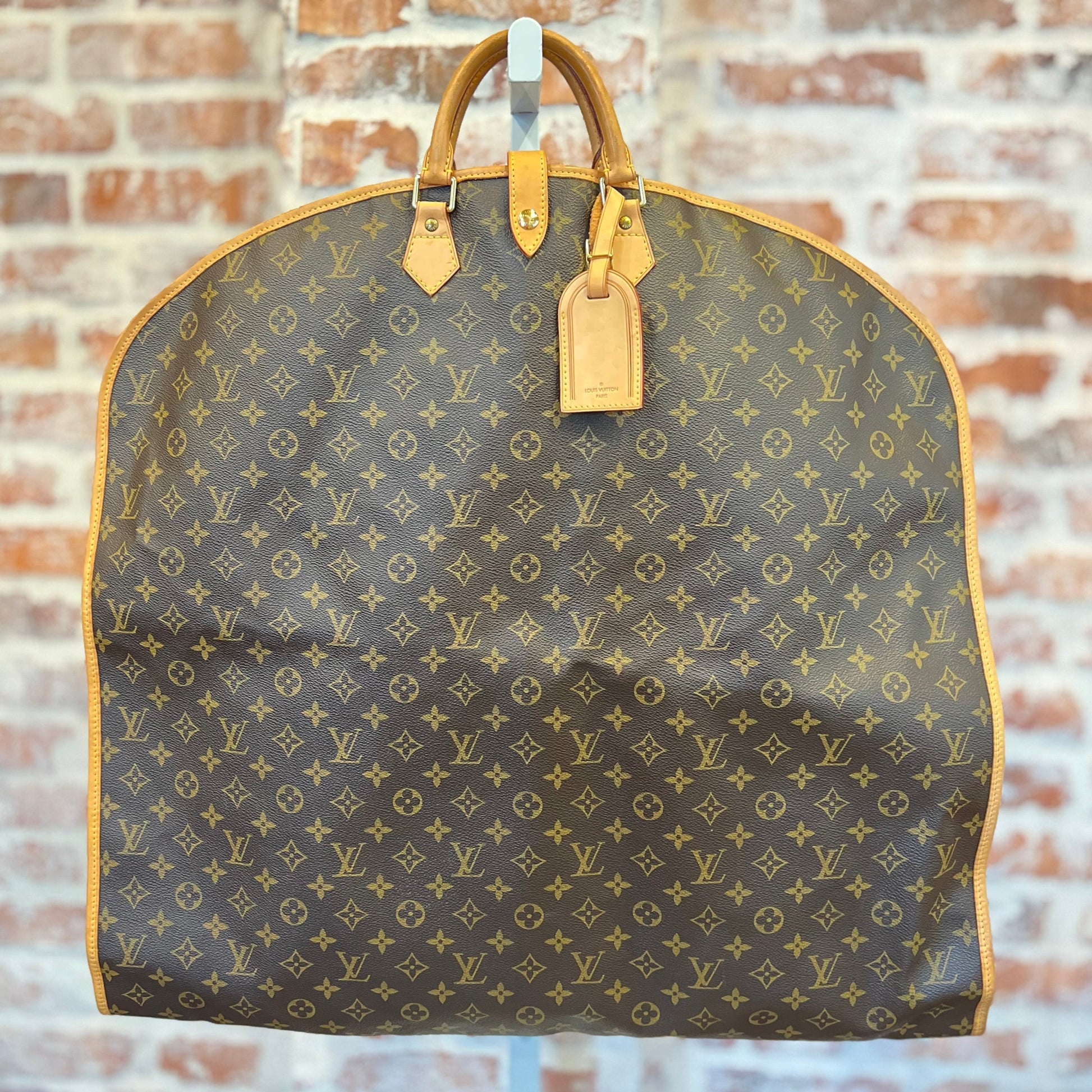LOUIS VUITTON Brown Monogram Coated Canvas Garment Cover Crossbody