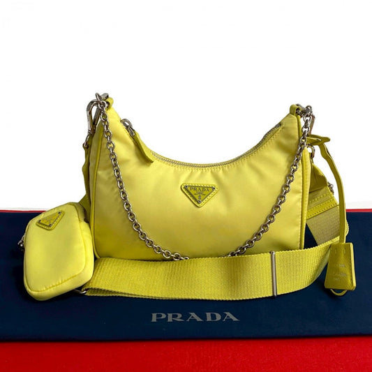 PRADA Shoulder Bag Nylon, Leather yellow Triangle Logo Metal Re-edition Women