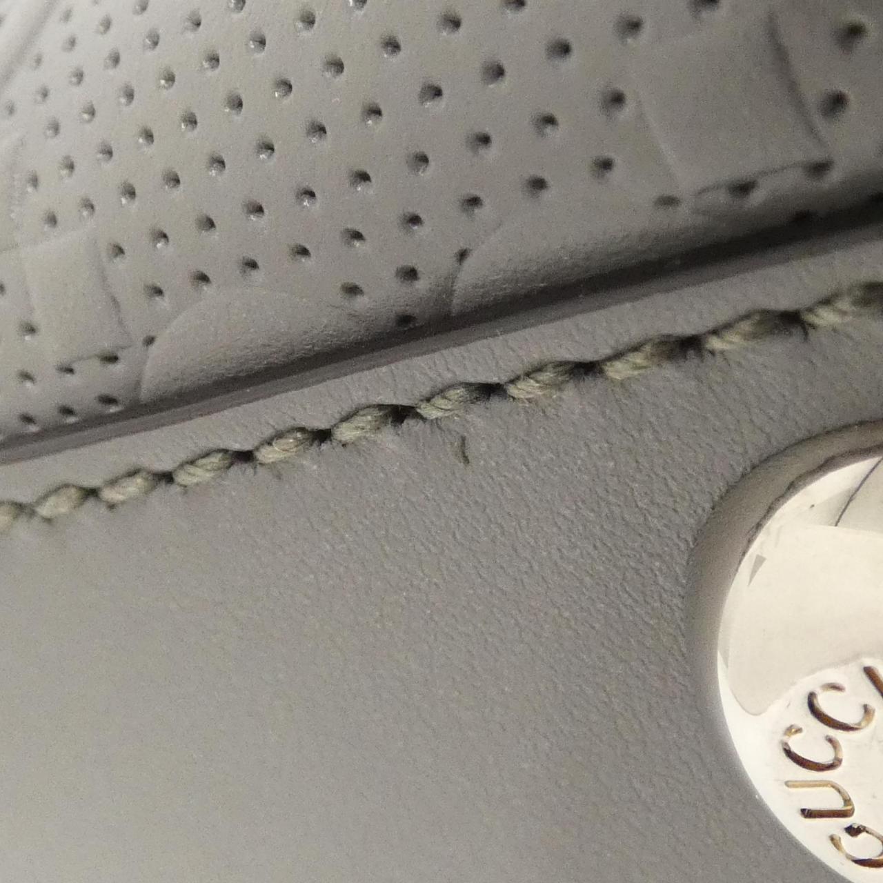 Gucci GG Embossed Leather Bag