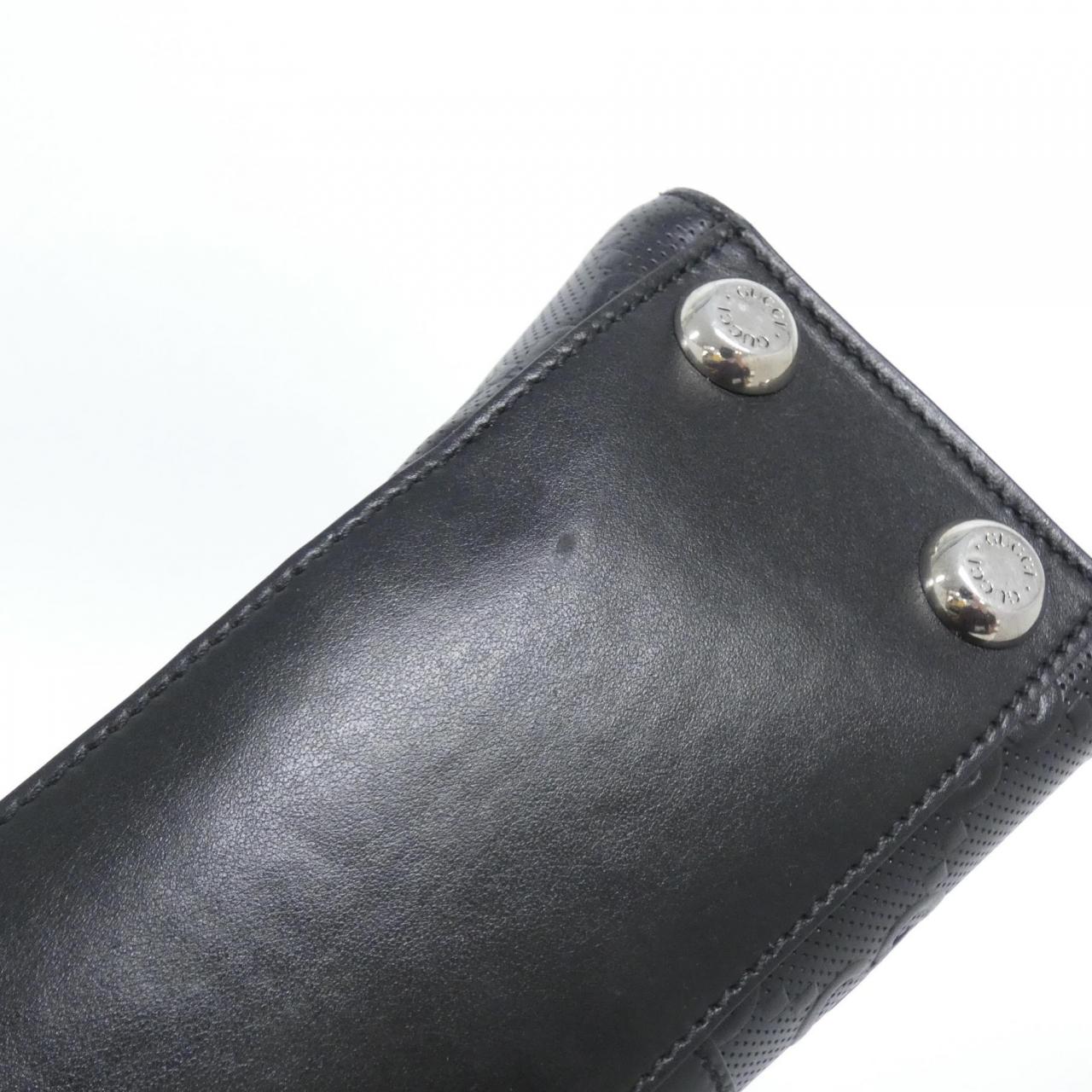 Gucci GG Embossed Leather Bag