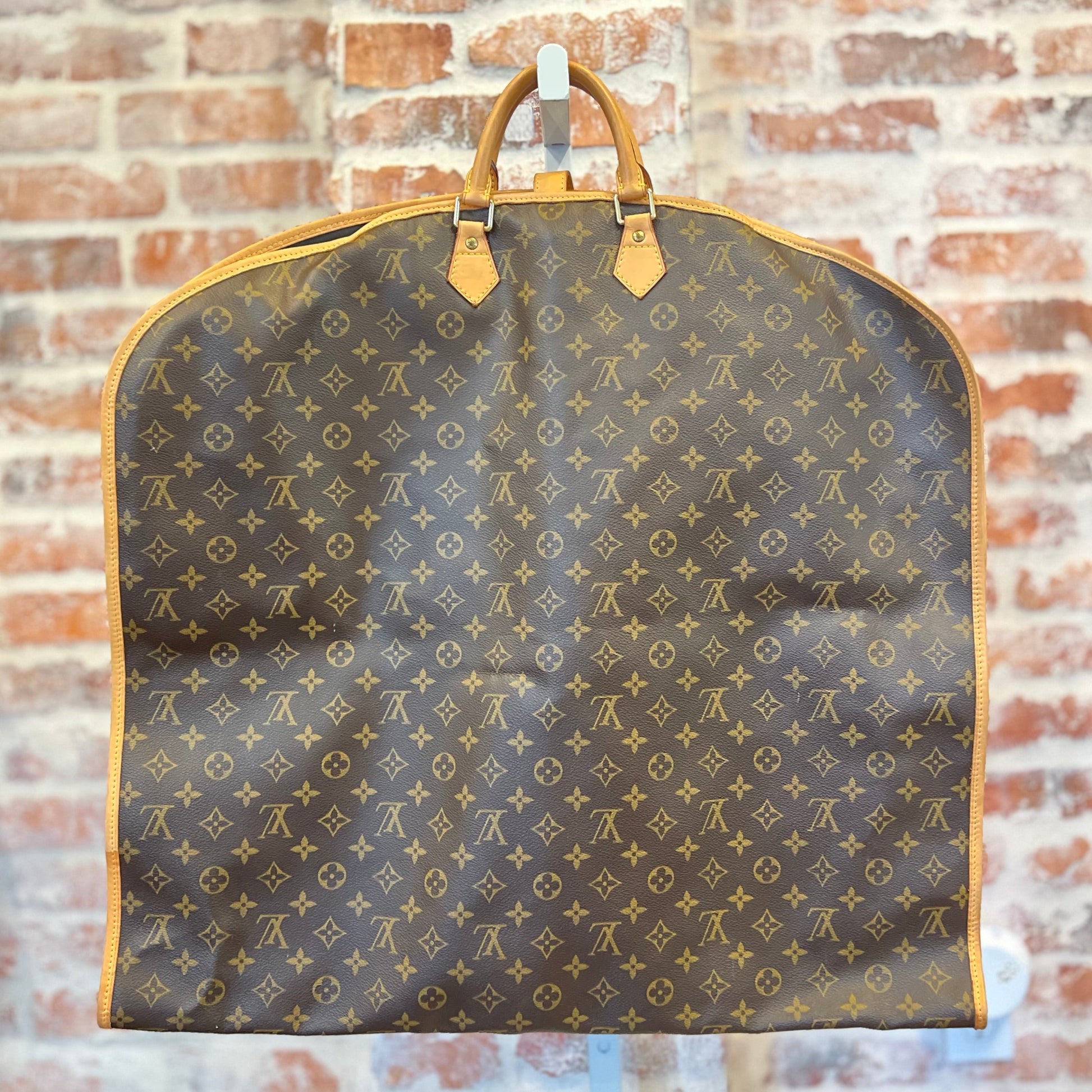 LOUIS VUITTON Brown Monogram Coated Canvas Garment Cover Crossbody