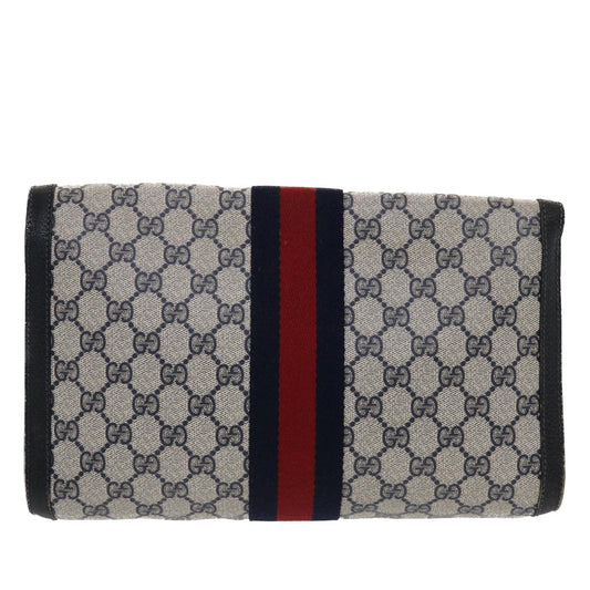 Gucci Leather Canvas Clutch
