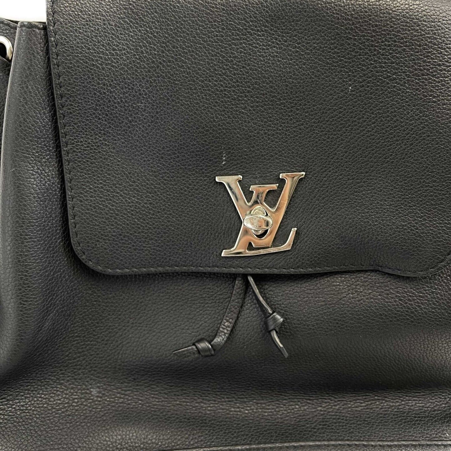 LOUIS VUITTON Lock Me Backpack