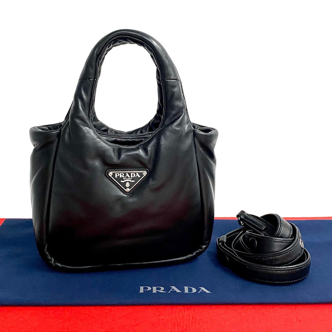 PRADA Shoulder Bag leather black Triangular logo Soft padding Women