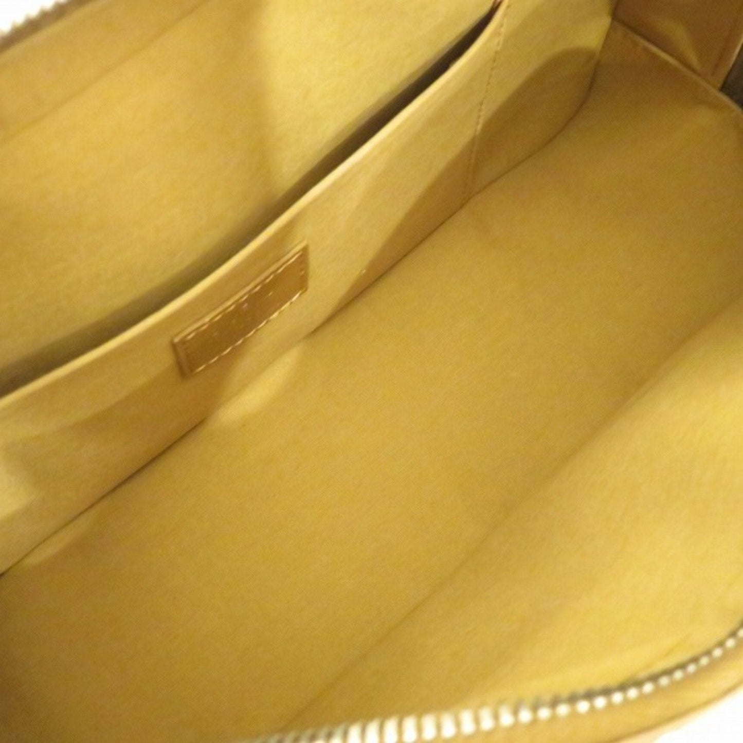 Louis Vuitton Gold Patent leather Shelton handbag bag