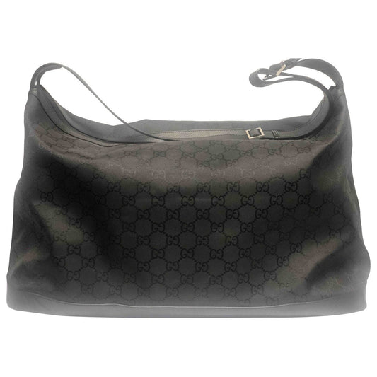 Gucci black cloth travel bag