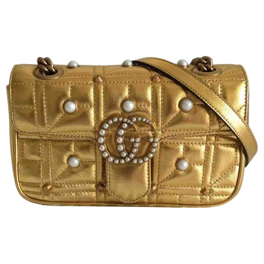 Gucci marmont gold leather handbag