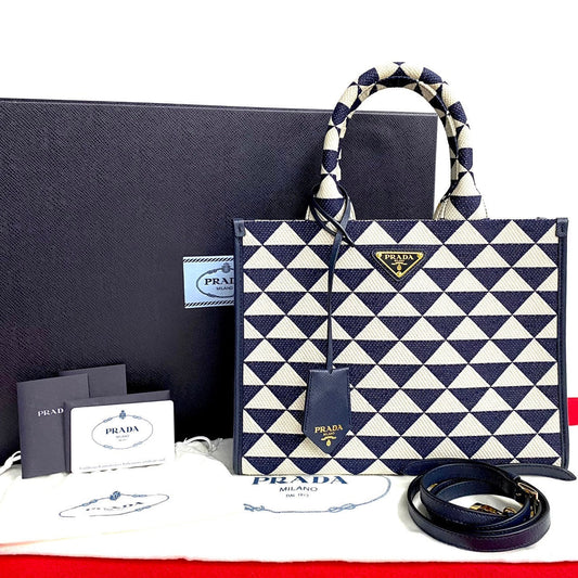 PRADA Handbag Canvas, Leather Navy Triangle Logo Metal Symbol Embroidery Fabric Small Women