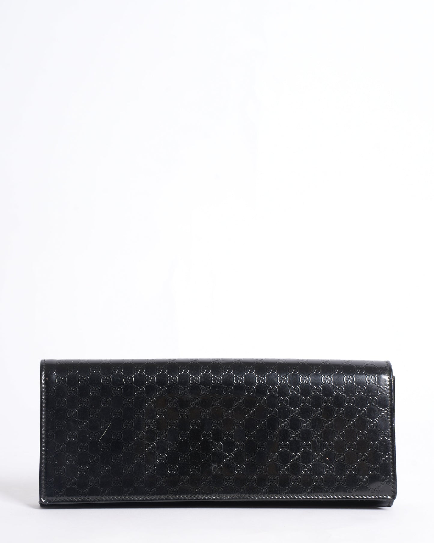 Gucci Monogram Leather Clutch