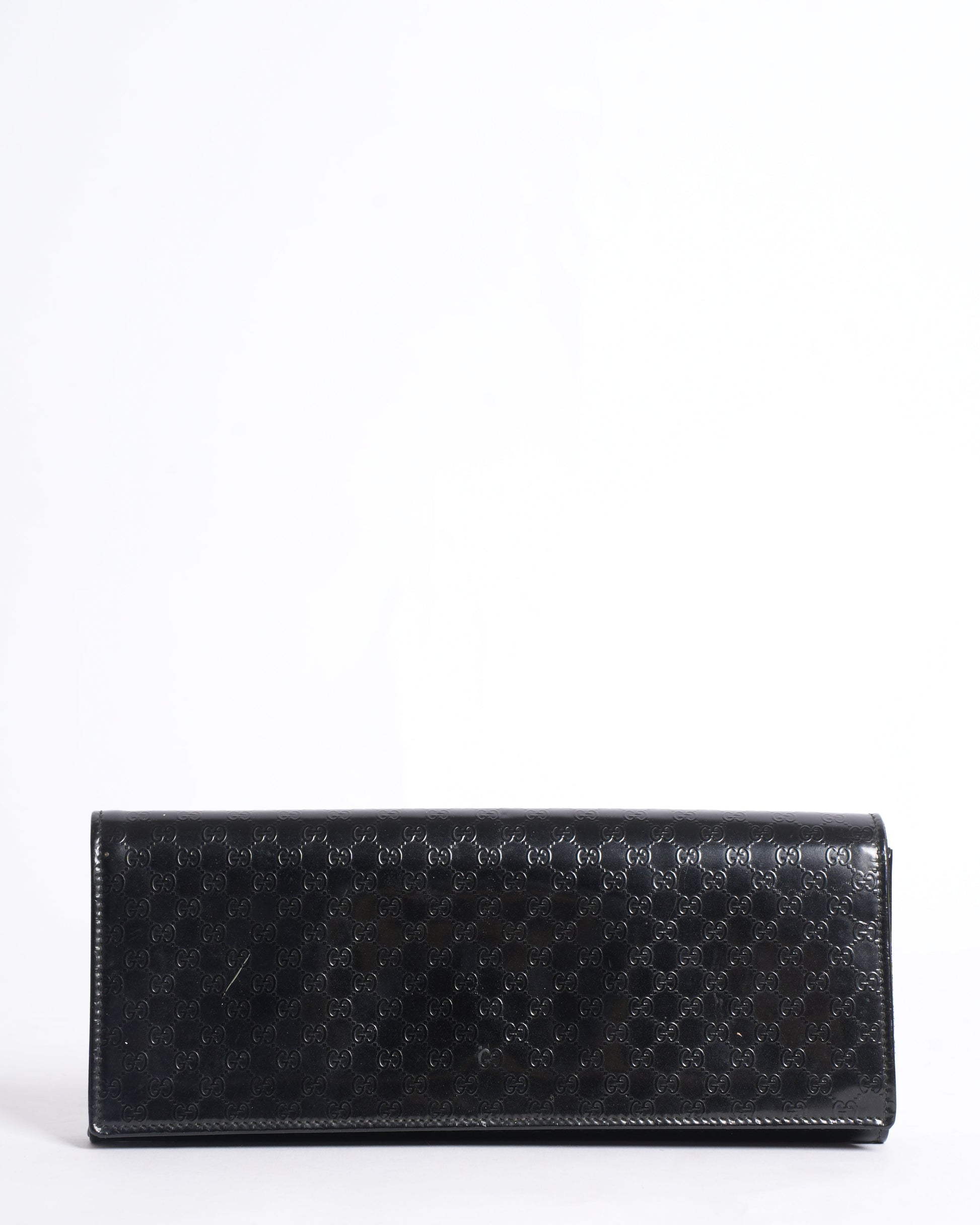 Gucci Monogram Leather Clutch