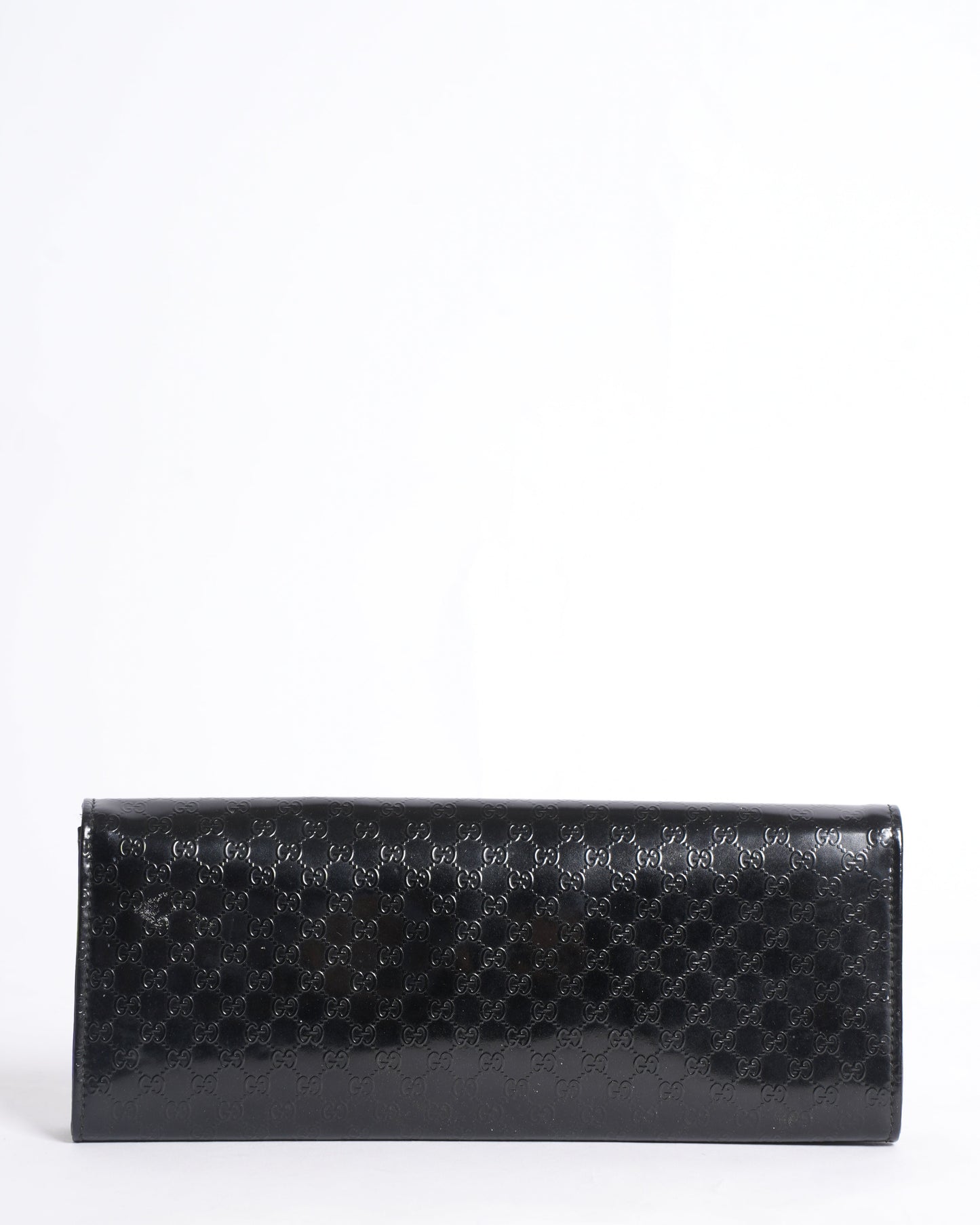 Gucci Monogram Leather Clutch