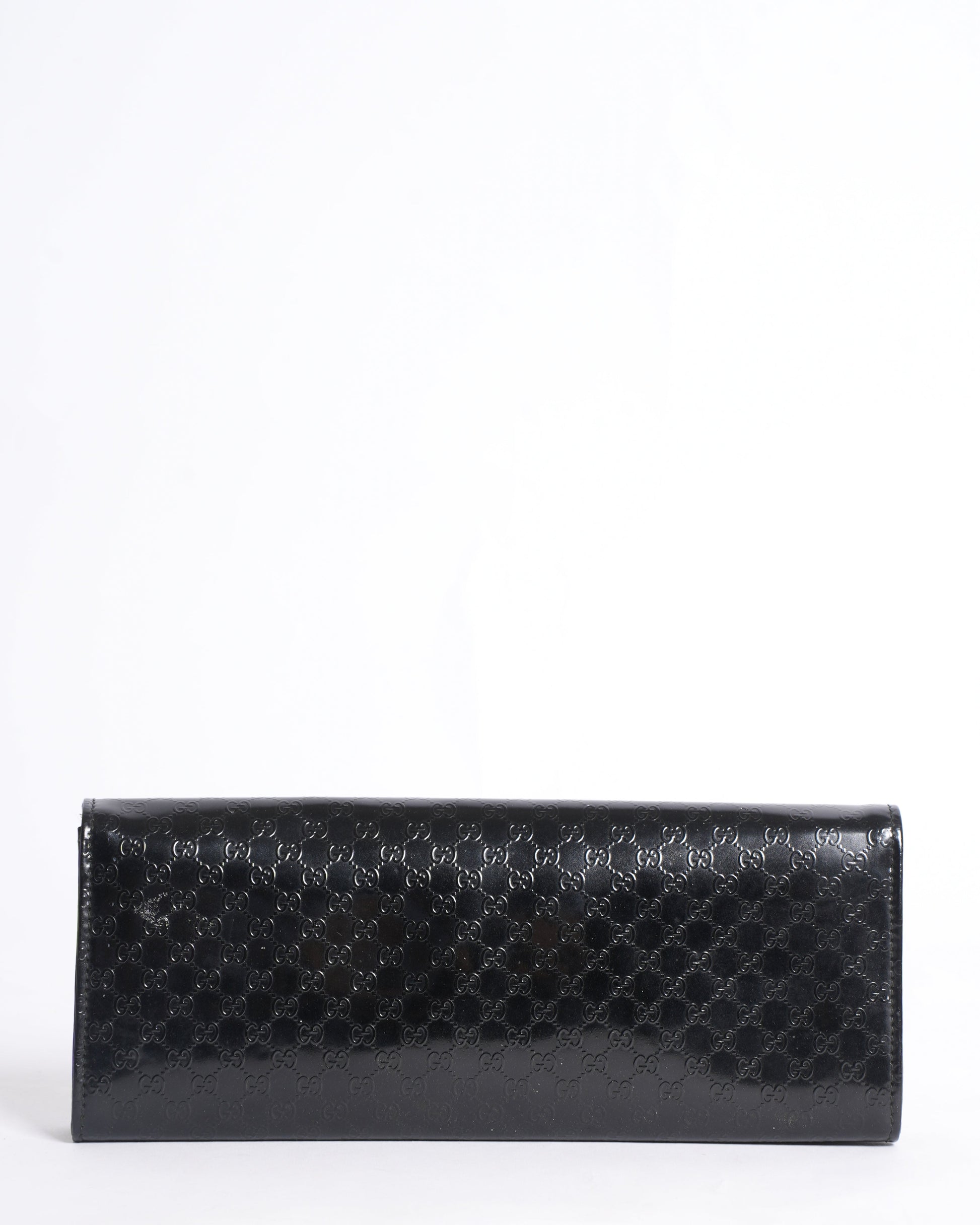 Gucci Monogram Leather Clutch