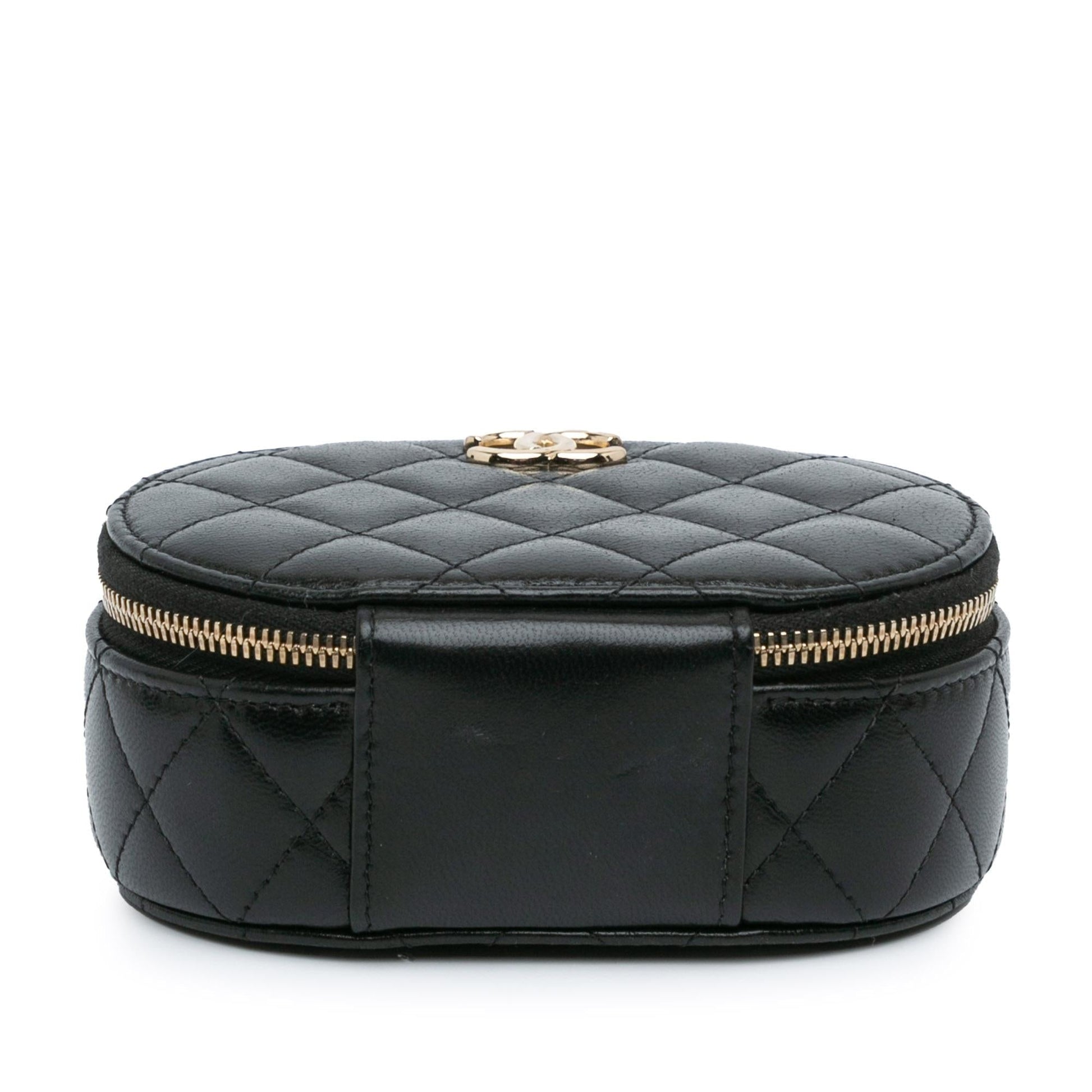 Chanel CC Quilted Lambskin Oval Top Handle Clutch