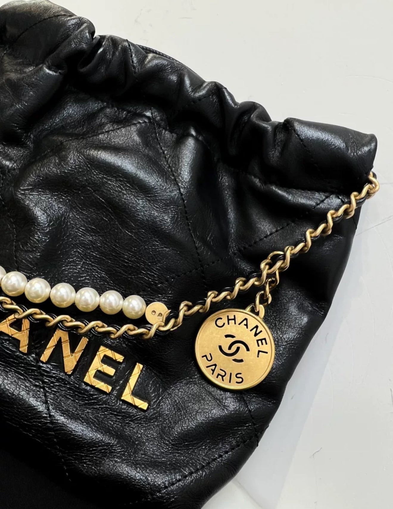 Chanel Black Quilted Calfskin Imitation Pearl Strap Mini 22 Hobo Bag Gold Hardware