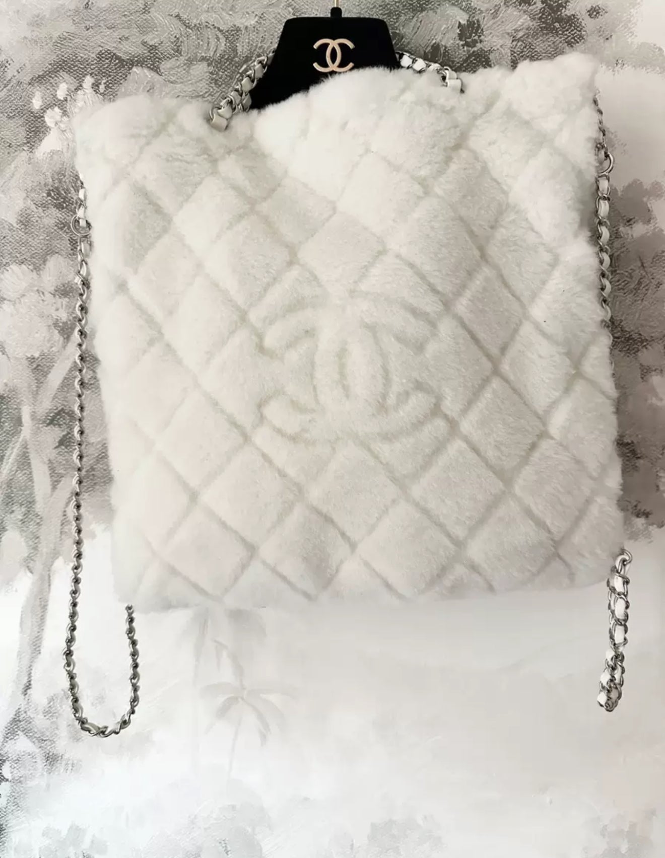 Chanel 22N white fur backpack