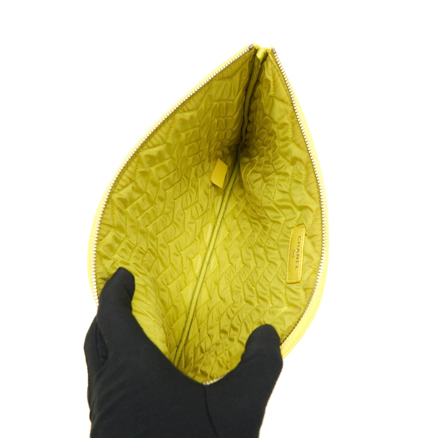 CHANEL CHEVRON CLUTCH BAG IN YELLOW