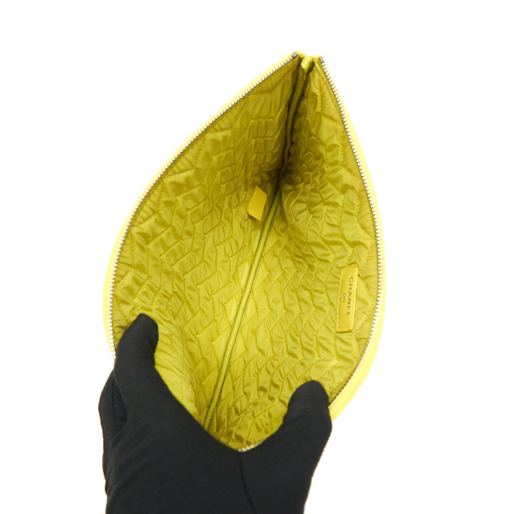 CHANEL CHEVRON CLUTCH BAG IN YELLOW