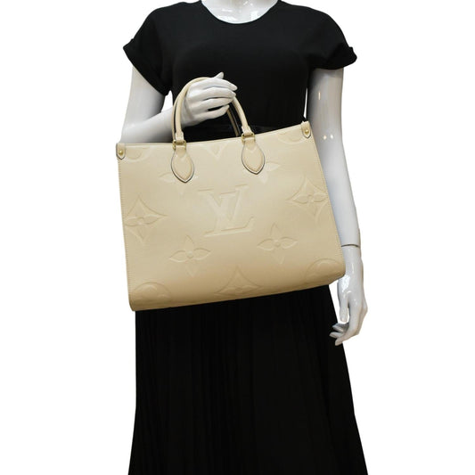 LOUIS VUITTON Onthego MM Monogram Empreinte Leather Tote Bag Cream