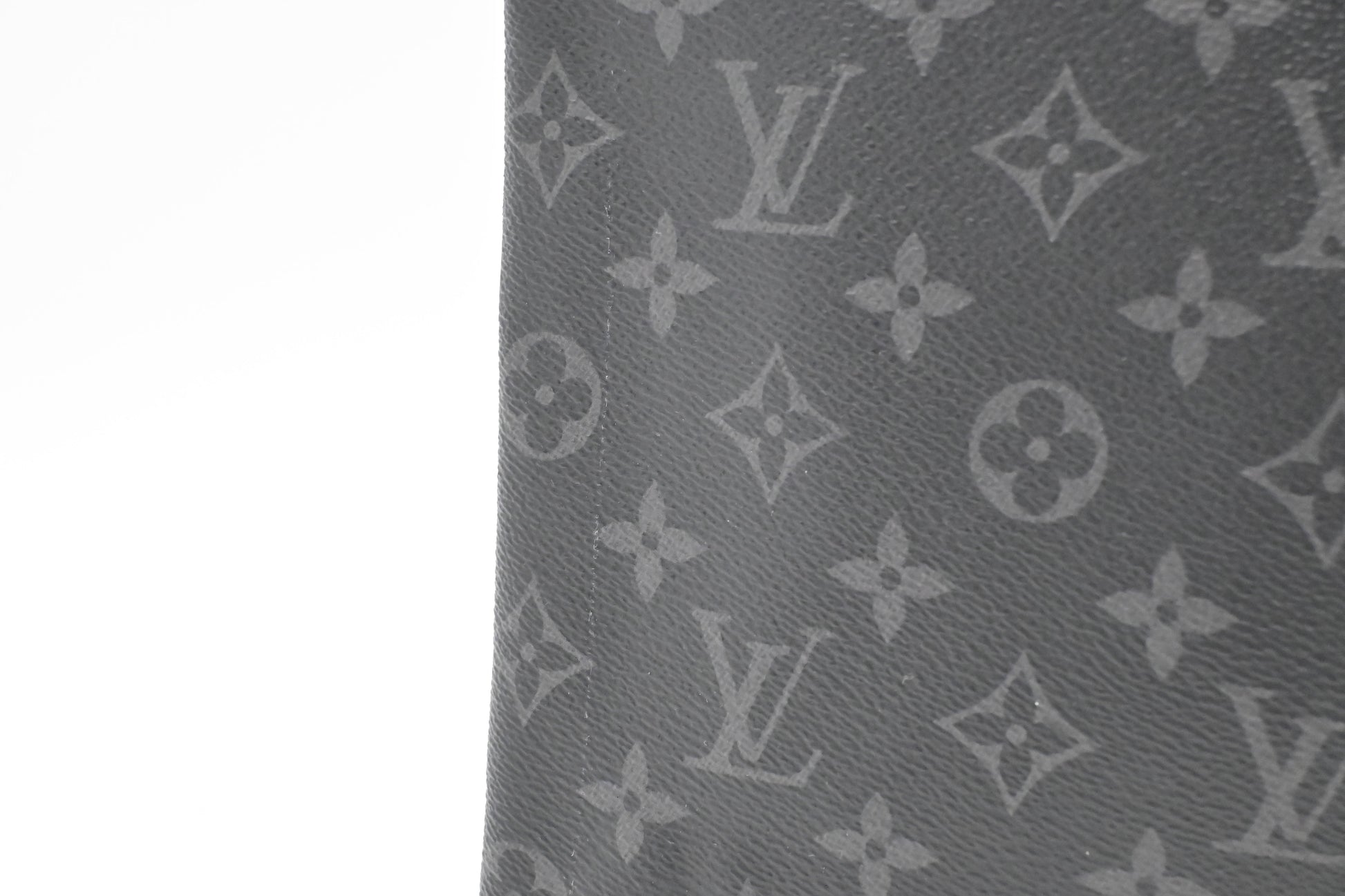 Louis Vuitton Pochette Discovery in Monogram Eclipse Canvas