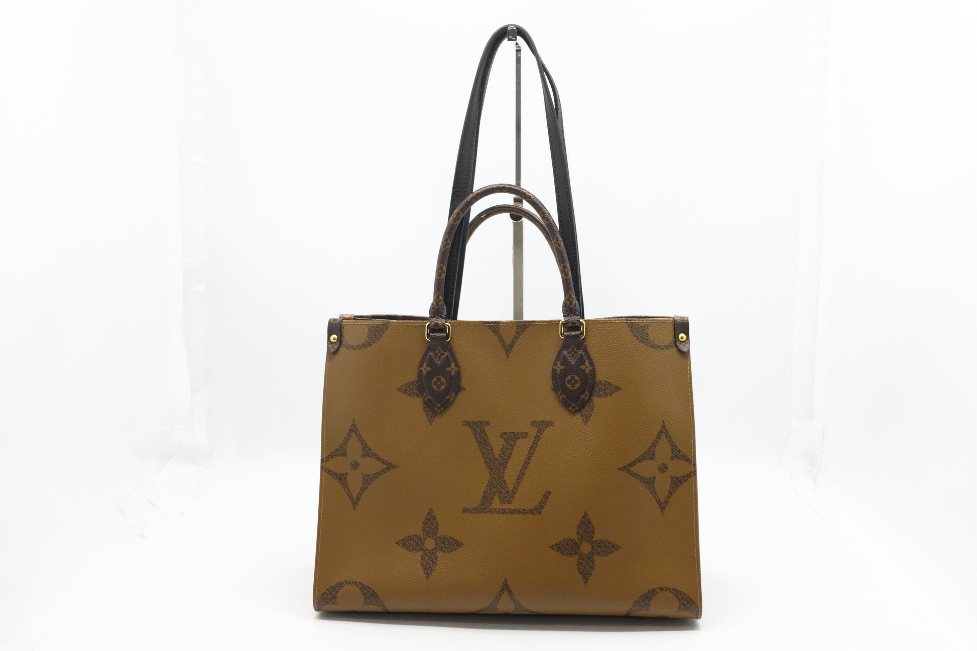 Louis Vuitton OnTheGo MM in Reverse Monogram Canvas