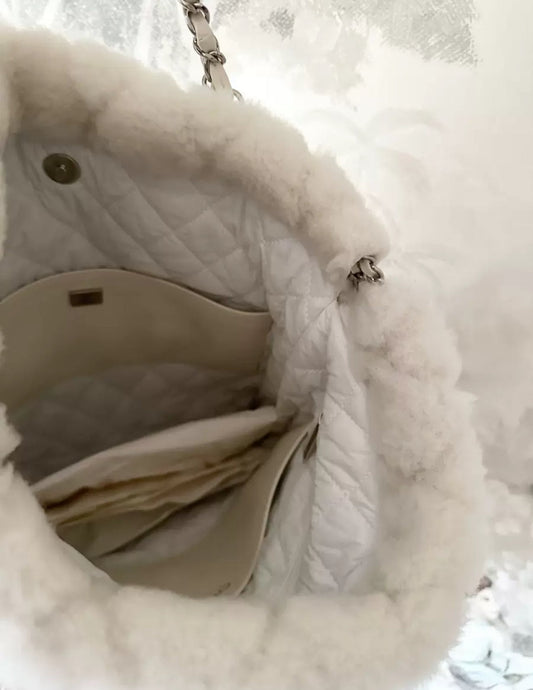 Chanel 22N white fur backpack
