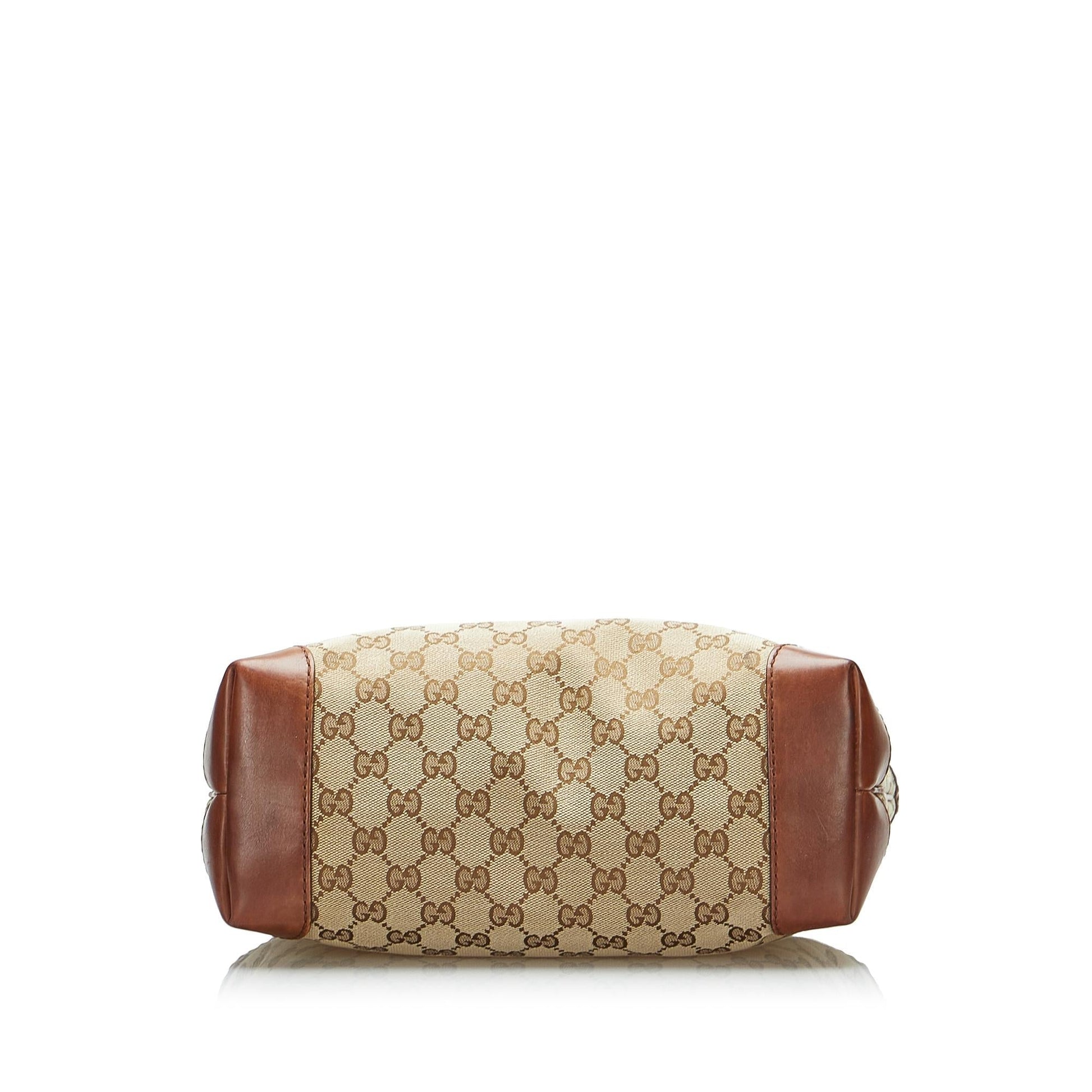 Gucci GG Canvas Stirrup Handbag (SHG-4H8XJO)