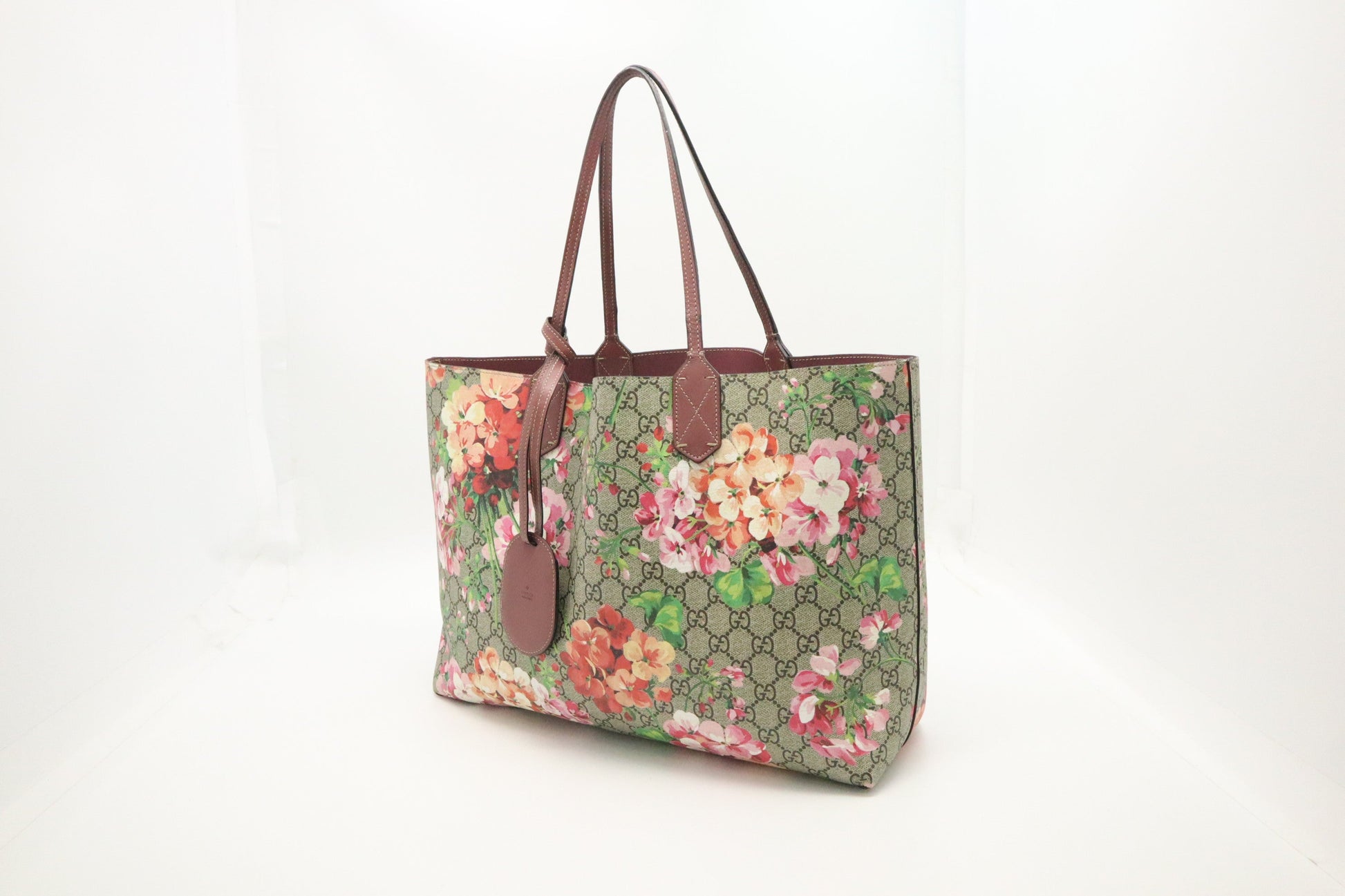 Gucci Reversible Tote in Pink Blooms GG Supreme Canvas