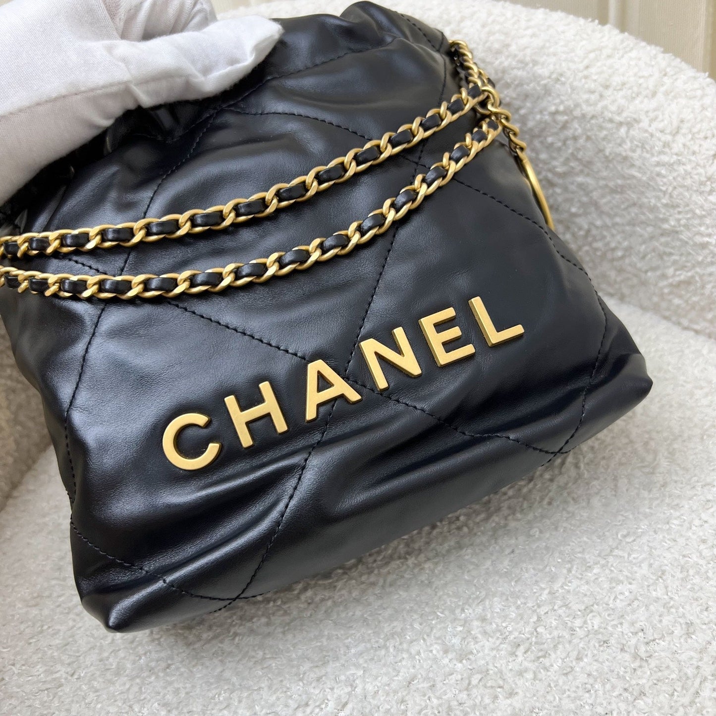 Chanel 22 Mini Hobo Handbag in Black Shiny Calfskin and AGHW