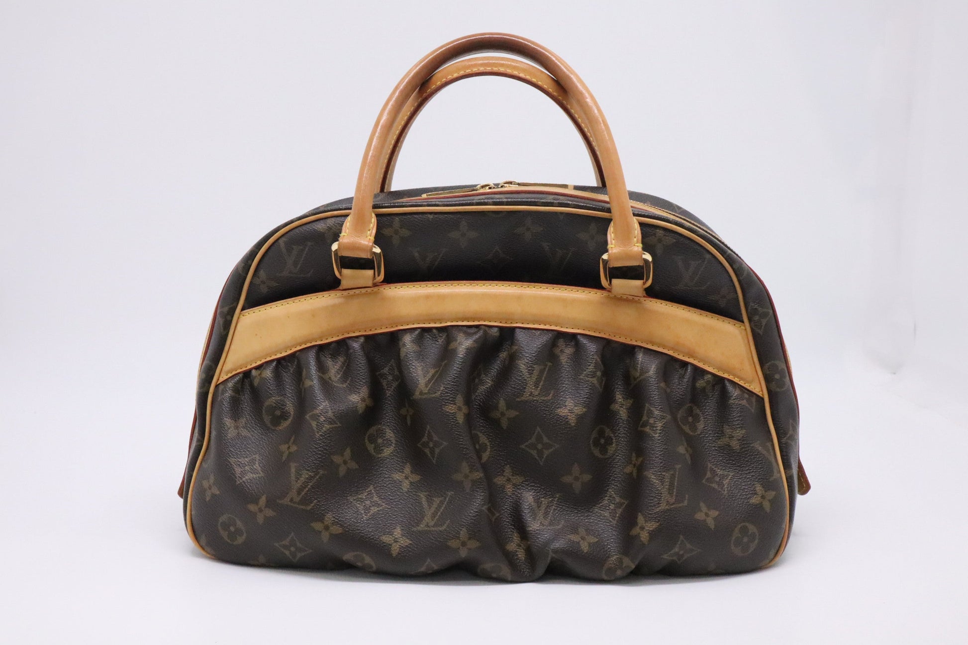 Louis Vuitton Mizi in Monogram Canvas