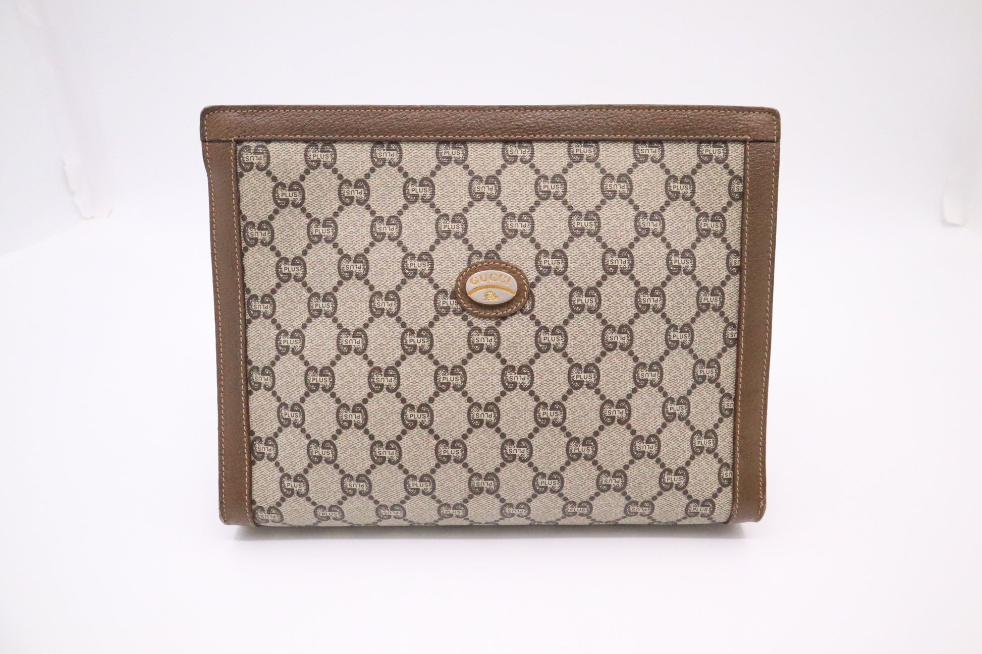 Gucci Plus Clutch in GG Supreme Canvas