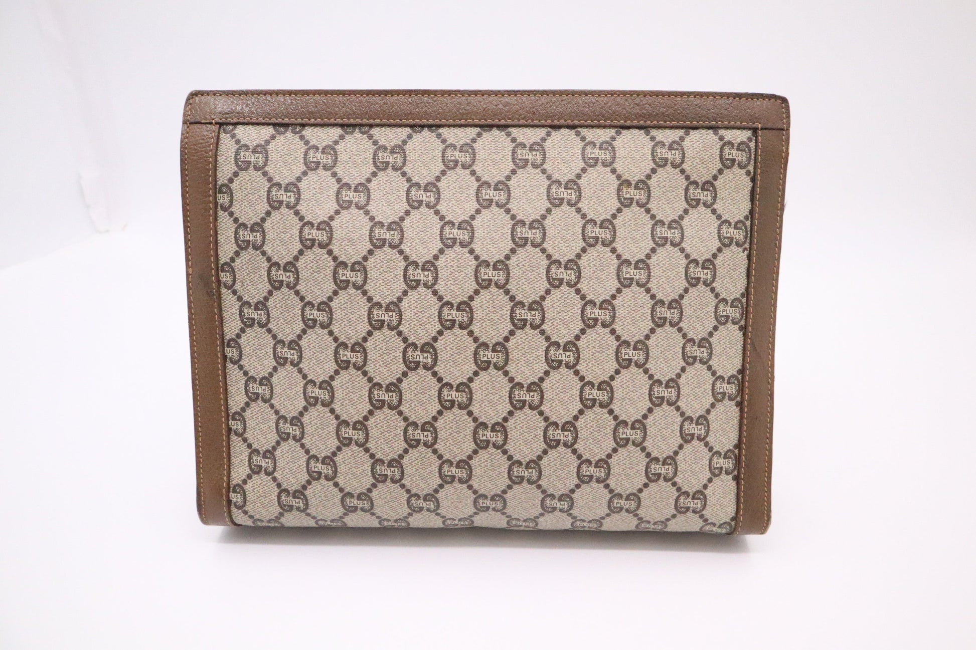 Gucci Plus Clutch in GG Supreme Canvas